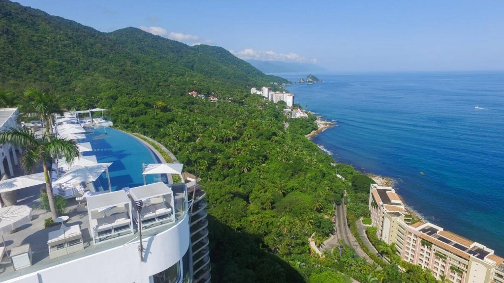 infinity pool overlooking mountains at hotel mousai