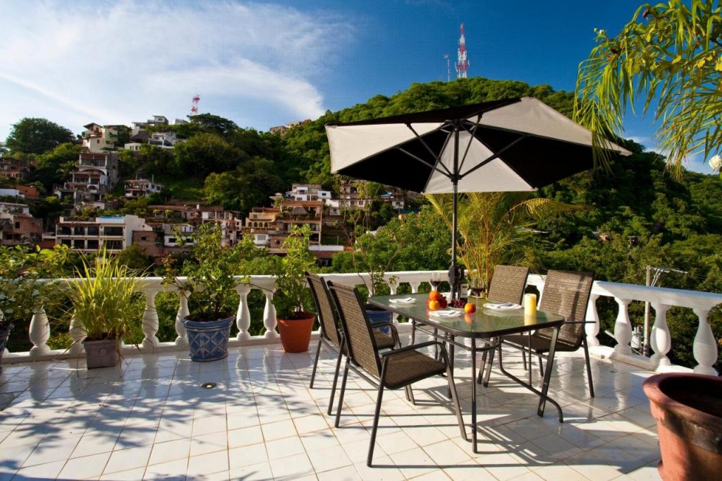 rooftop with outdoor patio furniture