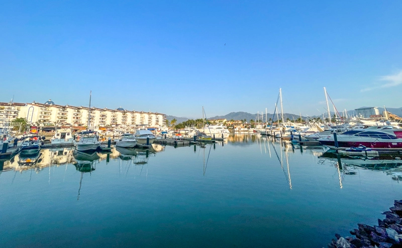 boats reflecting in the marina in marina vallarta mexico