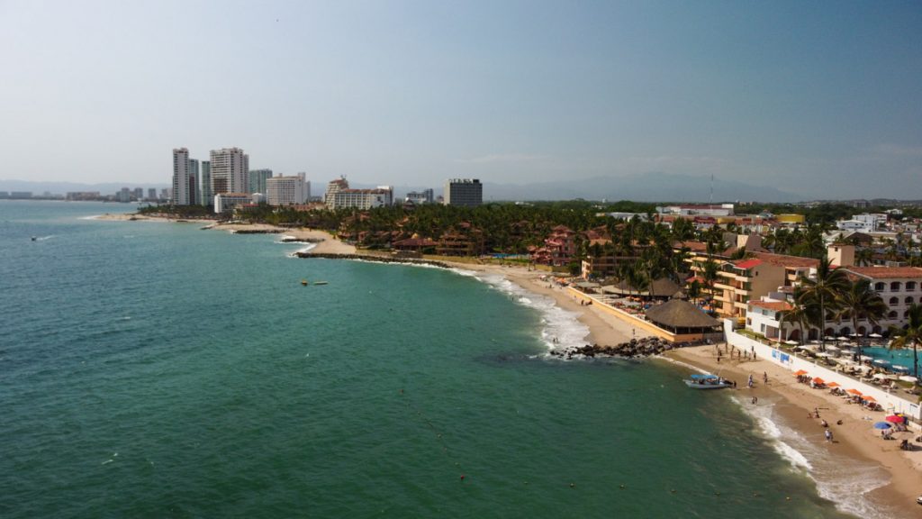 aerial view of the beach and hotels in the hotel zona puerto vallarta