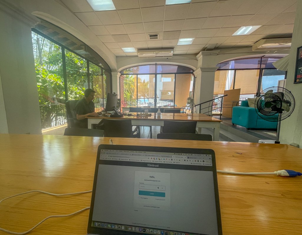 laptop on desk while coworking puerto vallarta mexico