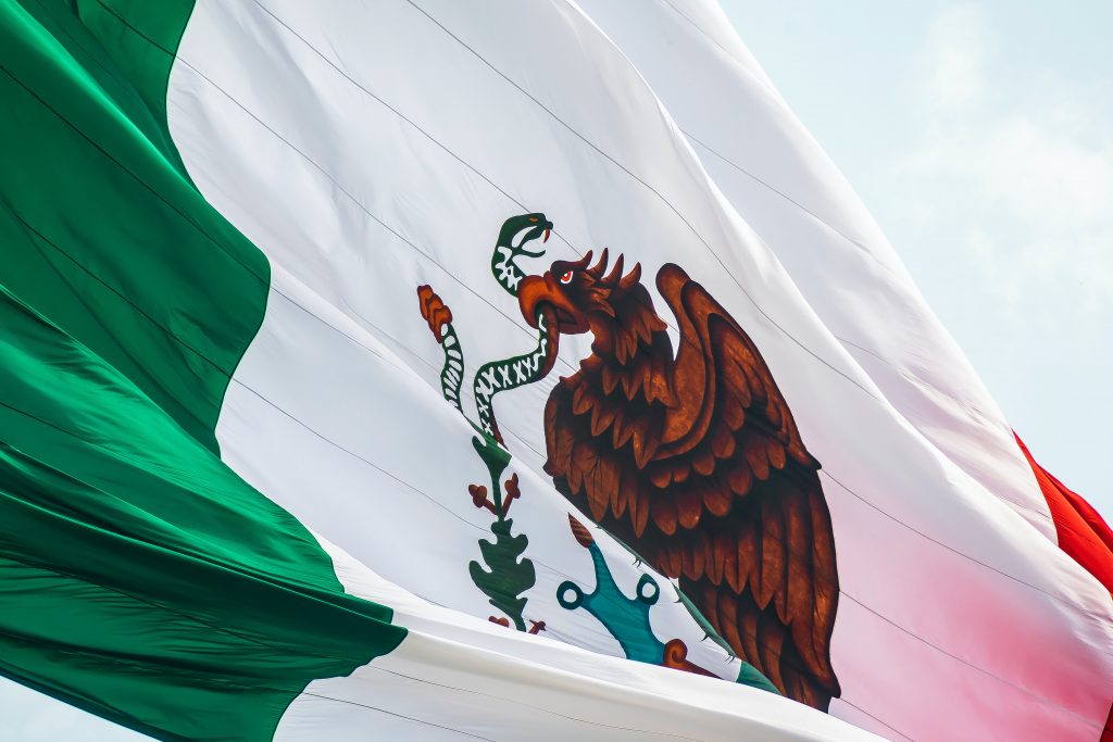 mexico flag waving in air