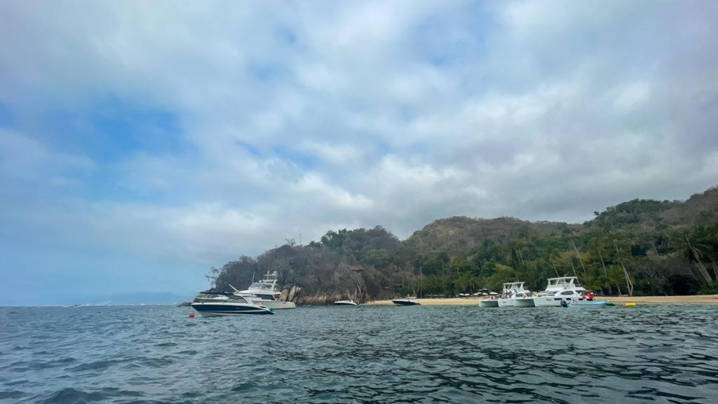 A water taxi to yelapa from puerto vallarta , maneuvering gracefully through the ocean waves