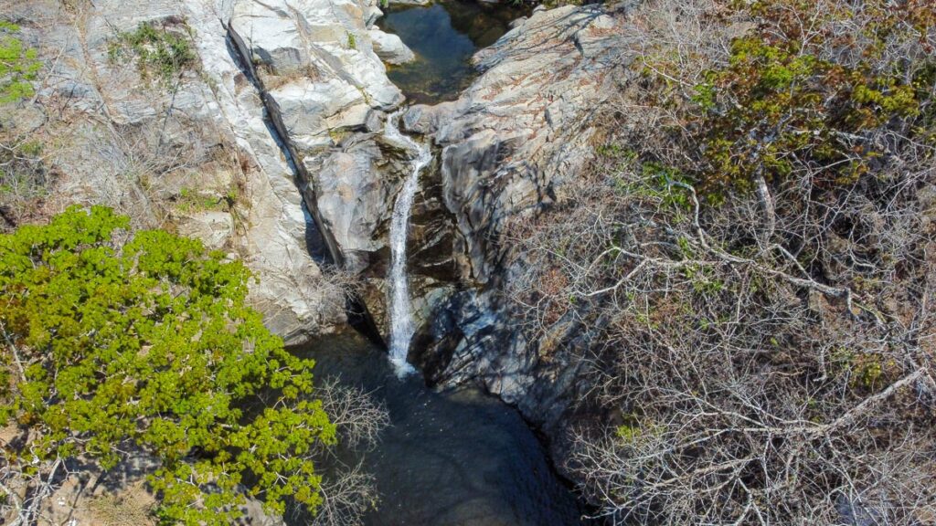 aerial shot of quimixto waterfall puerto vallarta