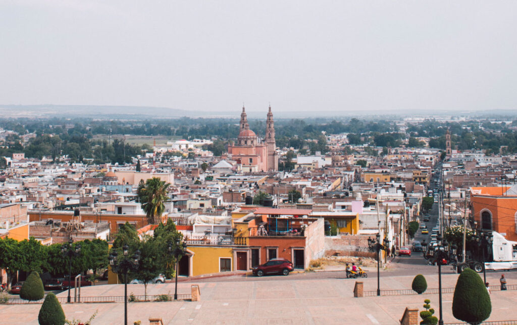 view of the town lagos de moreno in mexico. the church dominates the skyline.