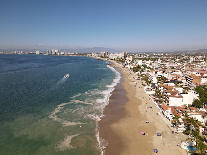 aerial view of long stretch of beach Playa Camarones puerto vallarta