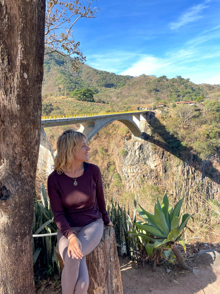 lora looking over bridge in mexico