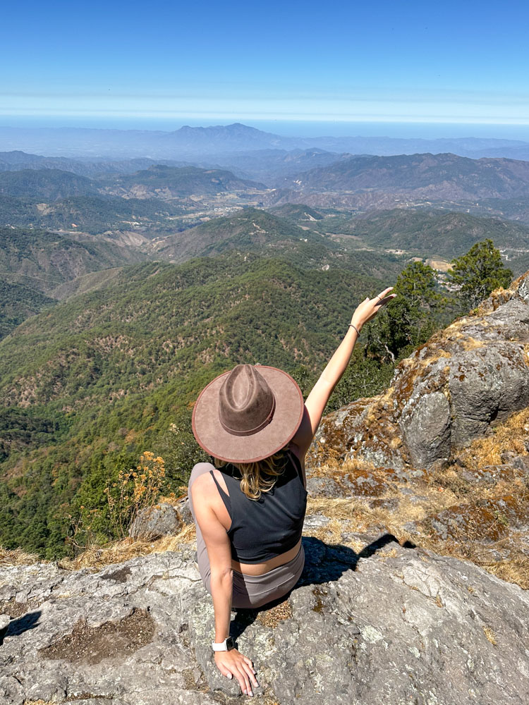 lora looking over la bufa viewpoint on a clear day with mountains in background