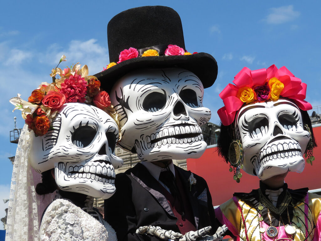 people dressed in skeleton costumes for day of the dead in mexico
