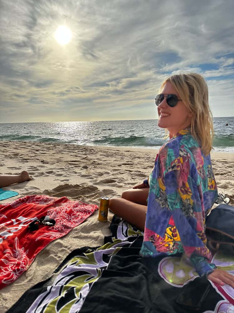 lora on the beach smiling