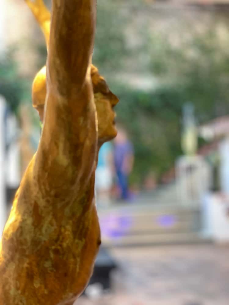 sculpture of a man in an art gallery in puerto vallarta