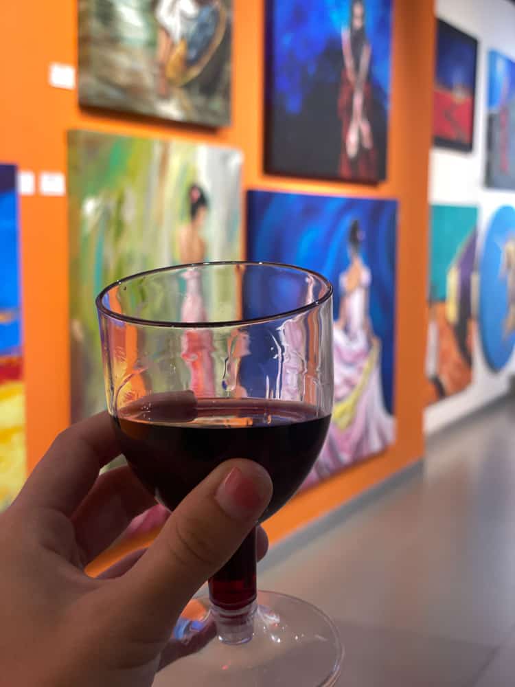 wine glass in art gallery puerto vallarta