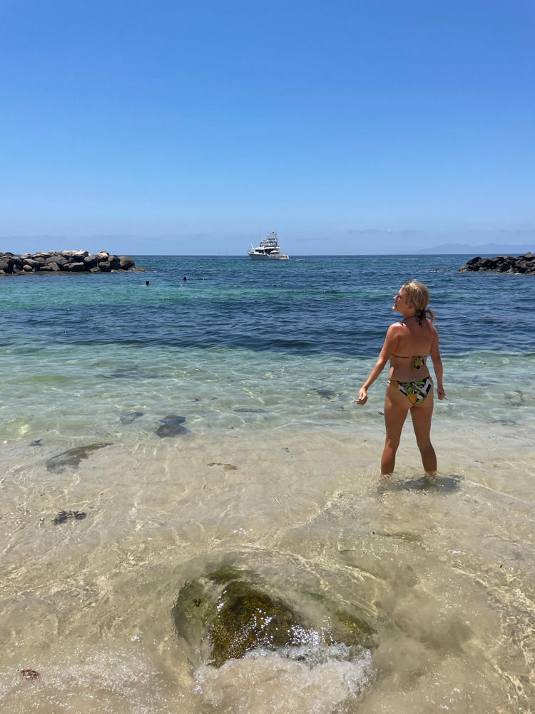Lora enjoying the ocean waters, surrounded by the beautiful shades of turquoise in Puerto Vallarta.