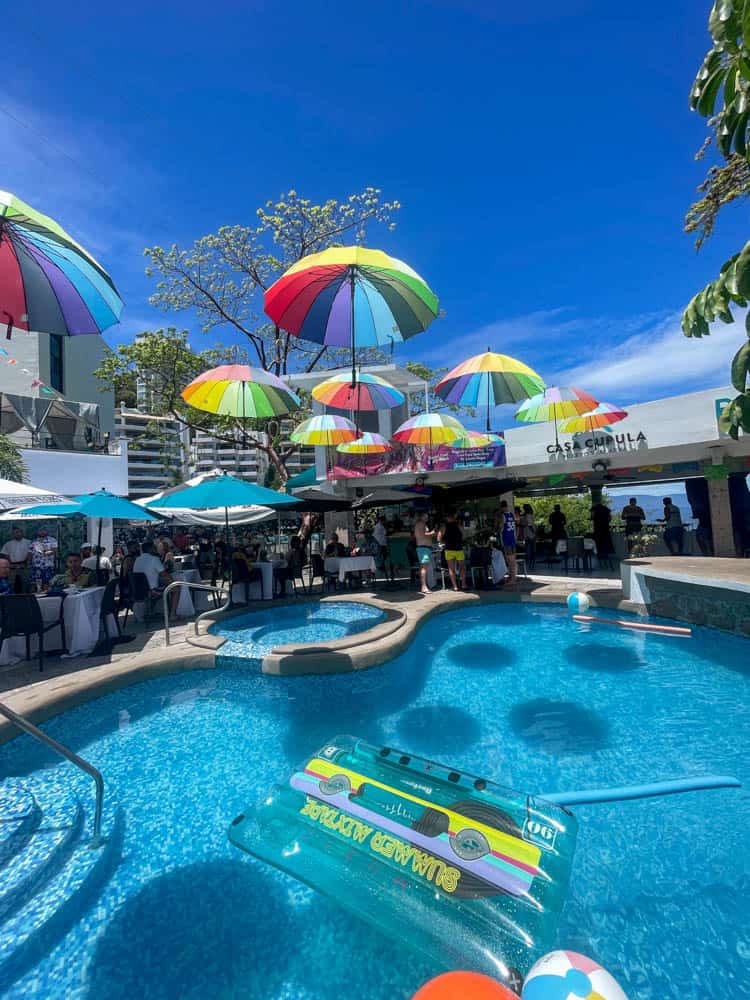 colorful umbrellas over pool at casa capula