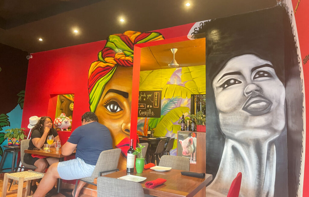 colorful murals inside a restaurant 